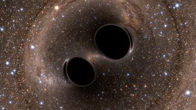 Black_hole_collision_and_merger_releasing_gravitational_waves