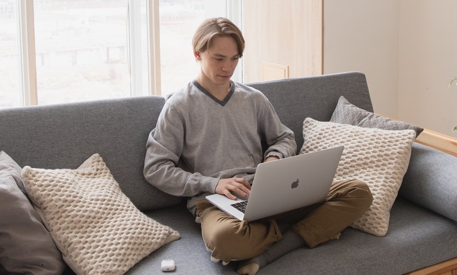 male student at laptop