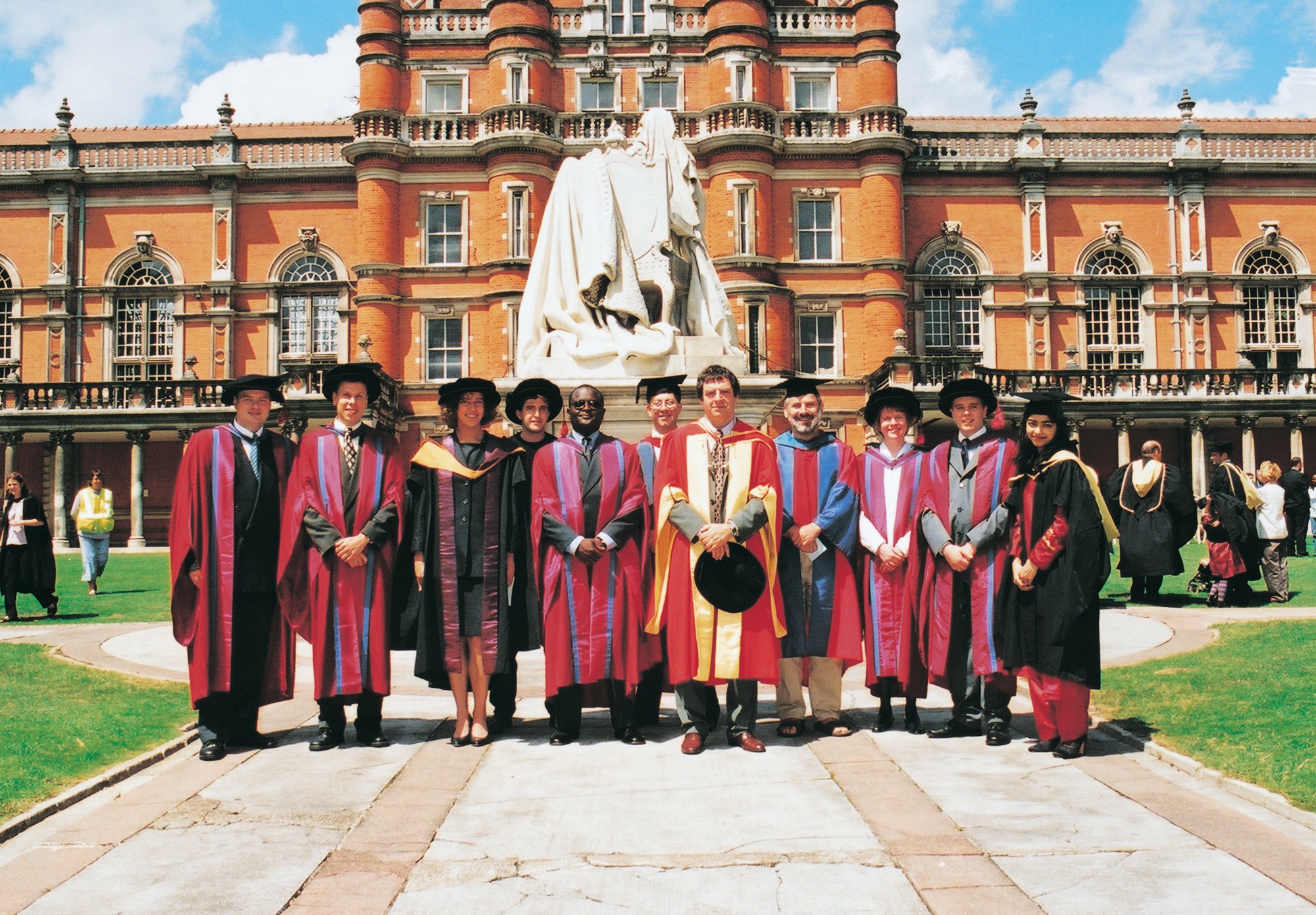 Postgraduates in graduation robes in the North Quad