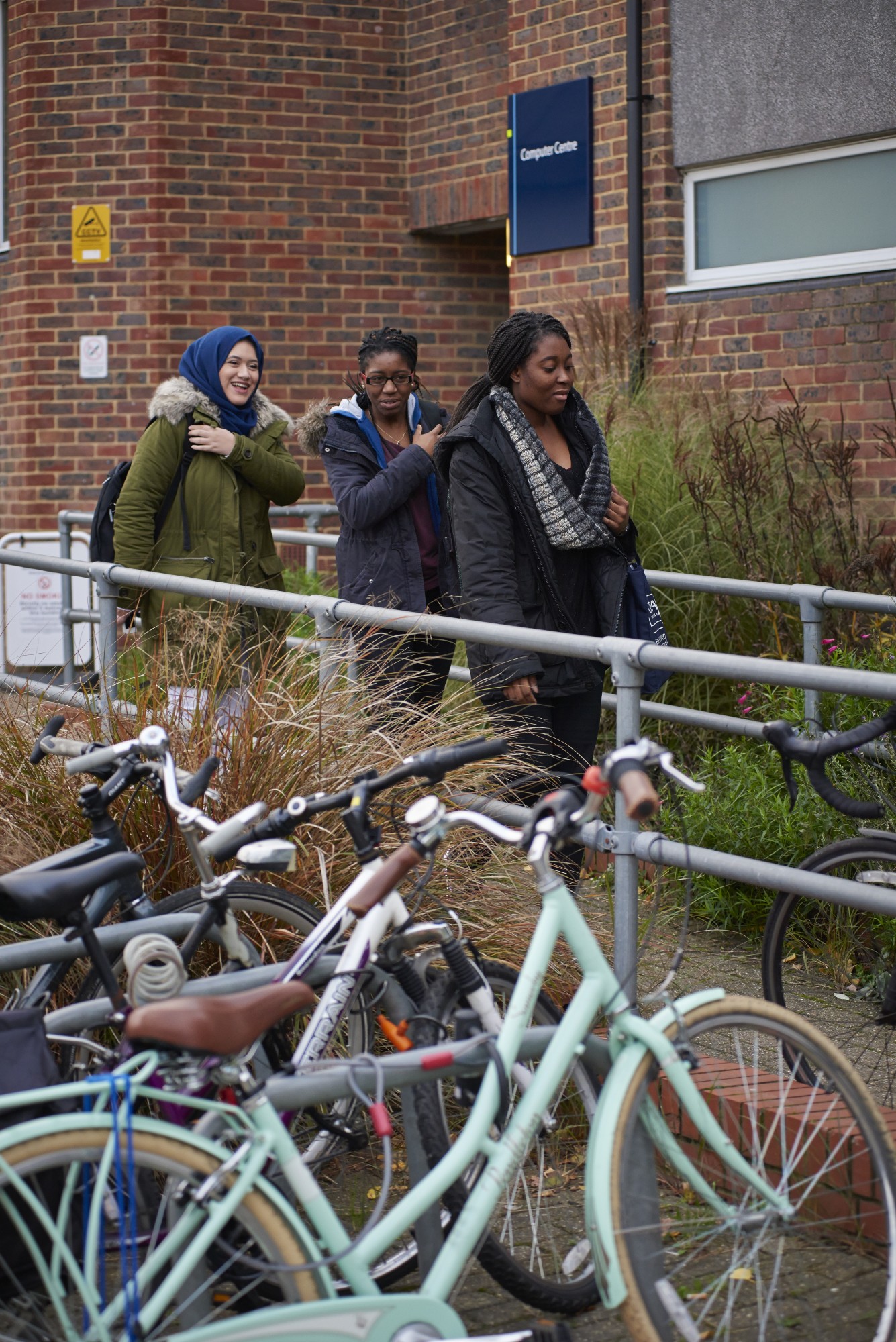 Bicycles and students outside the Bedford Library